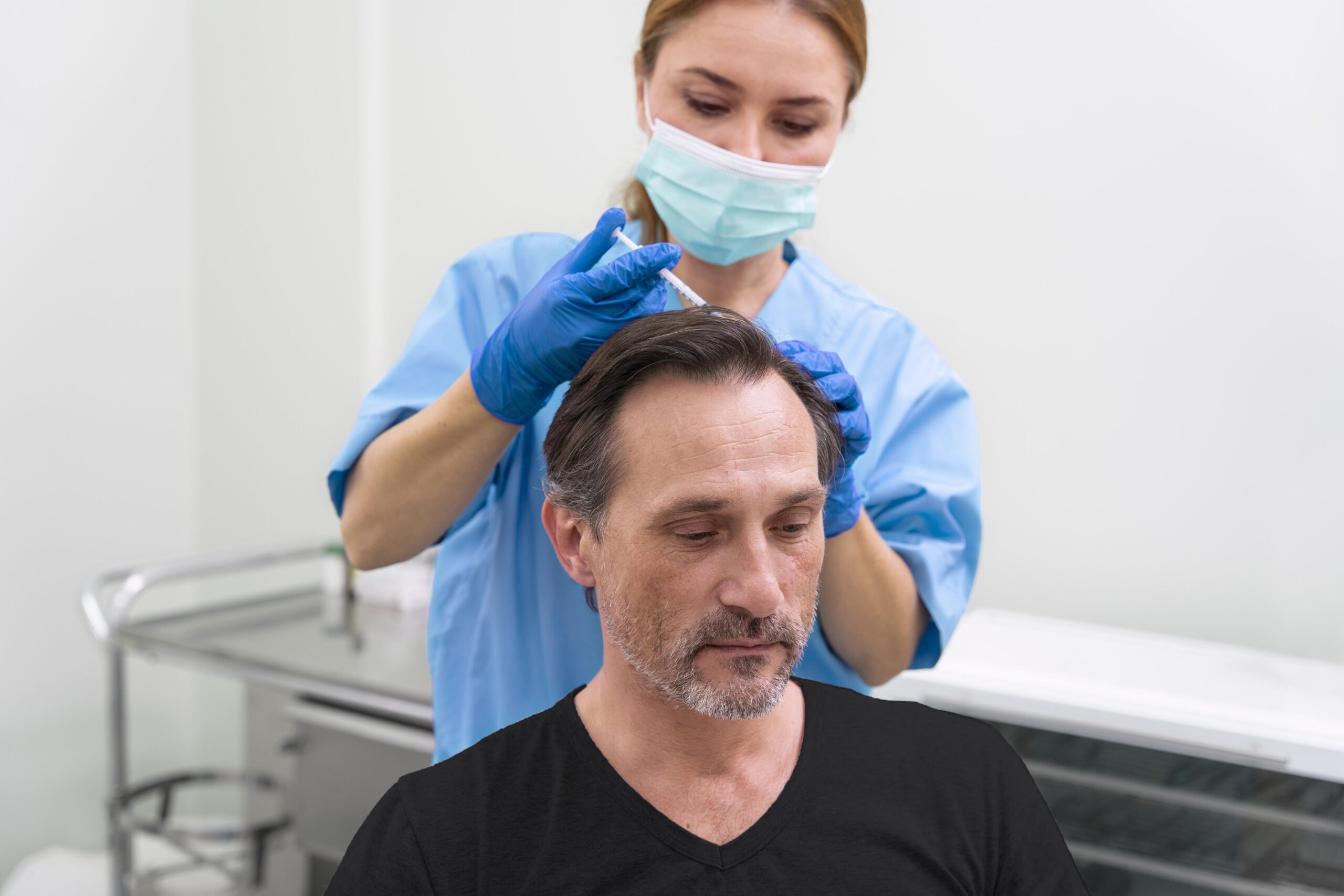 adult-male-getting-hair-loss-treatment